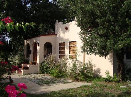 Front view of house, looking NE