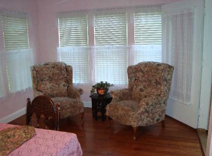 Seating Alcove to South of Dining Room.  Door on right opens to office.