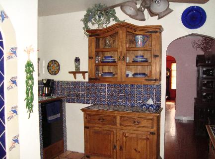 Kitchen cabinet on wall near Dining Room, facing West.