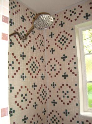 Looking left into shower, rain-style shower head.