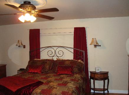 Another view of Master, showing ceiling medallion and custom fan light, facing East.